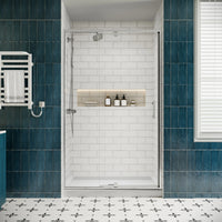 Front view of 42 in. chrome framed pivot shower door in a modern bathroom.
