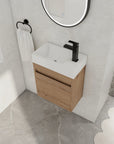 Angled bathroom view of 18" wall mount bathroom sink vanity with integrated resin sink in a modern setting | Ace Decor