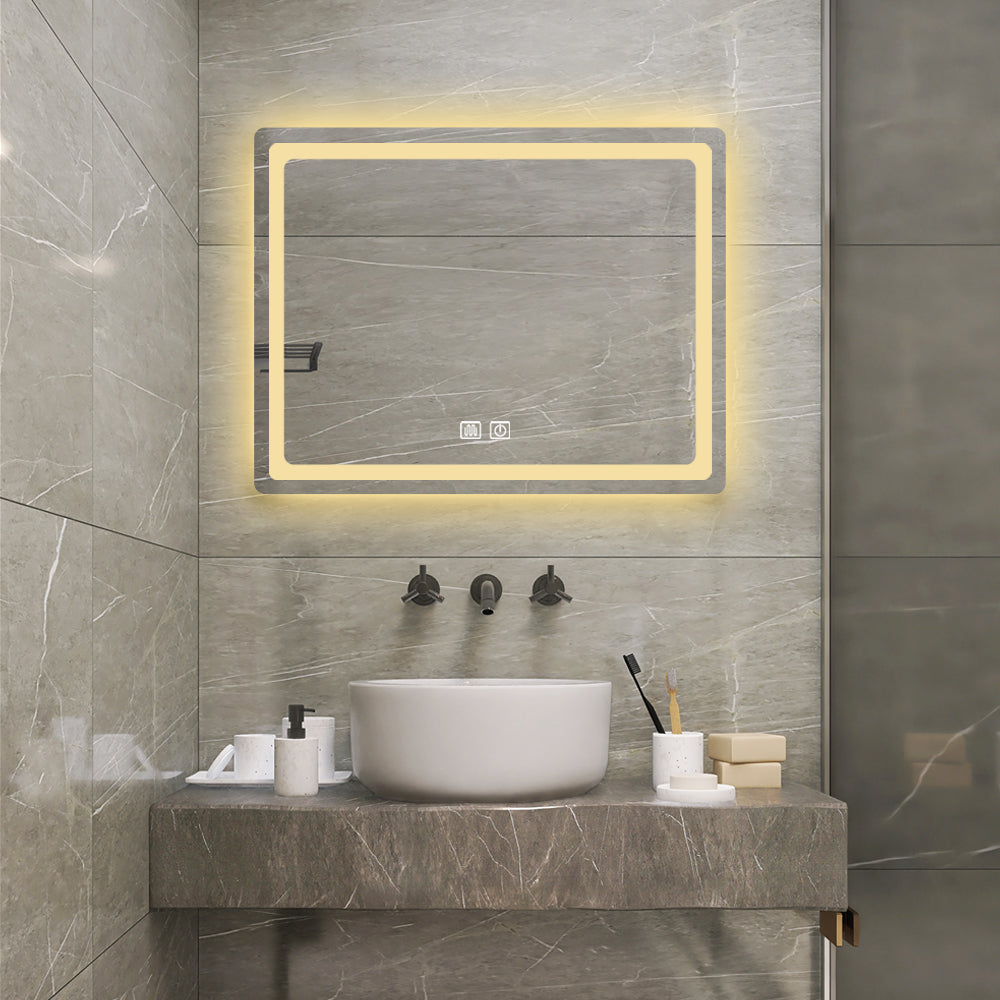 A minimalist bathroom setup featuring a vessel sink and a sleek rectangular mirror with LED lights for bathroom mirror use, glowing softly against elegant stone tiles.
