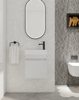 18" white bathroom sink with vanity in a modern bathroom setting with wall-mounted design | Ace Decor