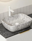 19 inch marble-look ceramic sink for bathroom on black vanity top | Ace Decor