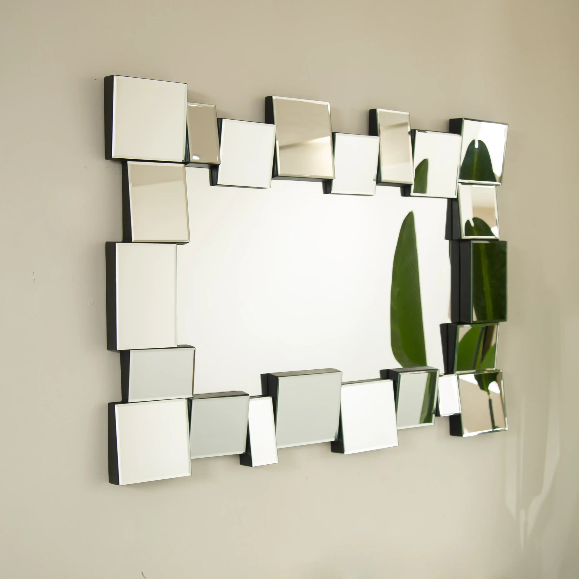 Angled view of the 39 x 29 modern decorative mirror highlighting its multi-layer geometric frame | Ace Decor