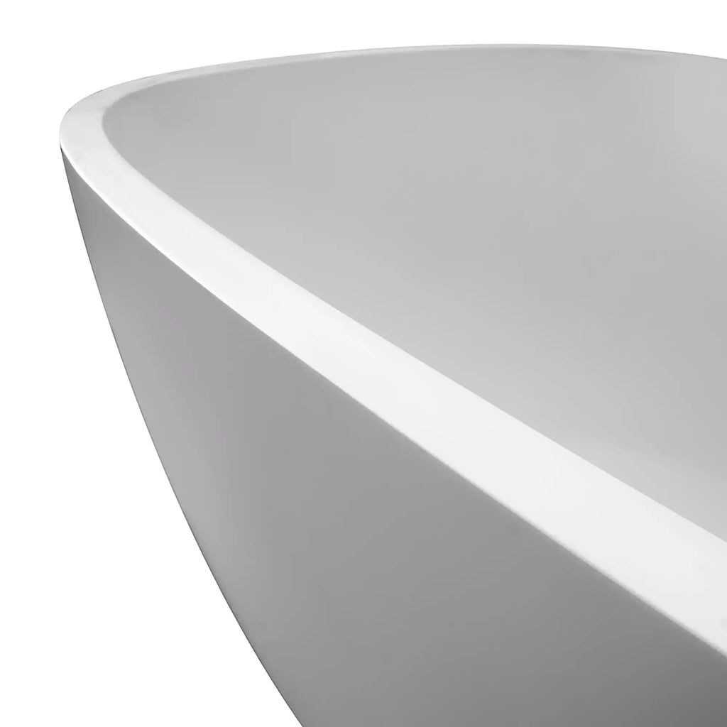 Close-up of rounded rim and seamless finish on 67" stain-resistant solid surface soaking bathtub.