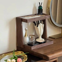 Bamboo Acrylic Two-Tier Bathroom Shelf organizing cups, bottles, and daily essentials on a bathroom countertop.