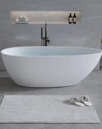 59" Matte White Egg-Shaped Resin Stone Freestanding Tub with Overflow & Pop-Up Drain – Stylish Solid Surface for Modern Bathrooms color: Matte White