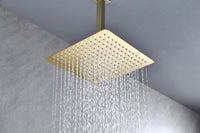 Lorton 12" brushed gold rain shower head delivering soft rainfall water flow.
