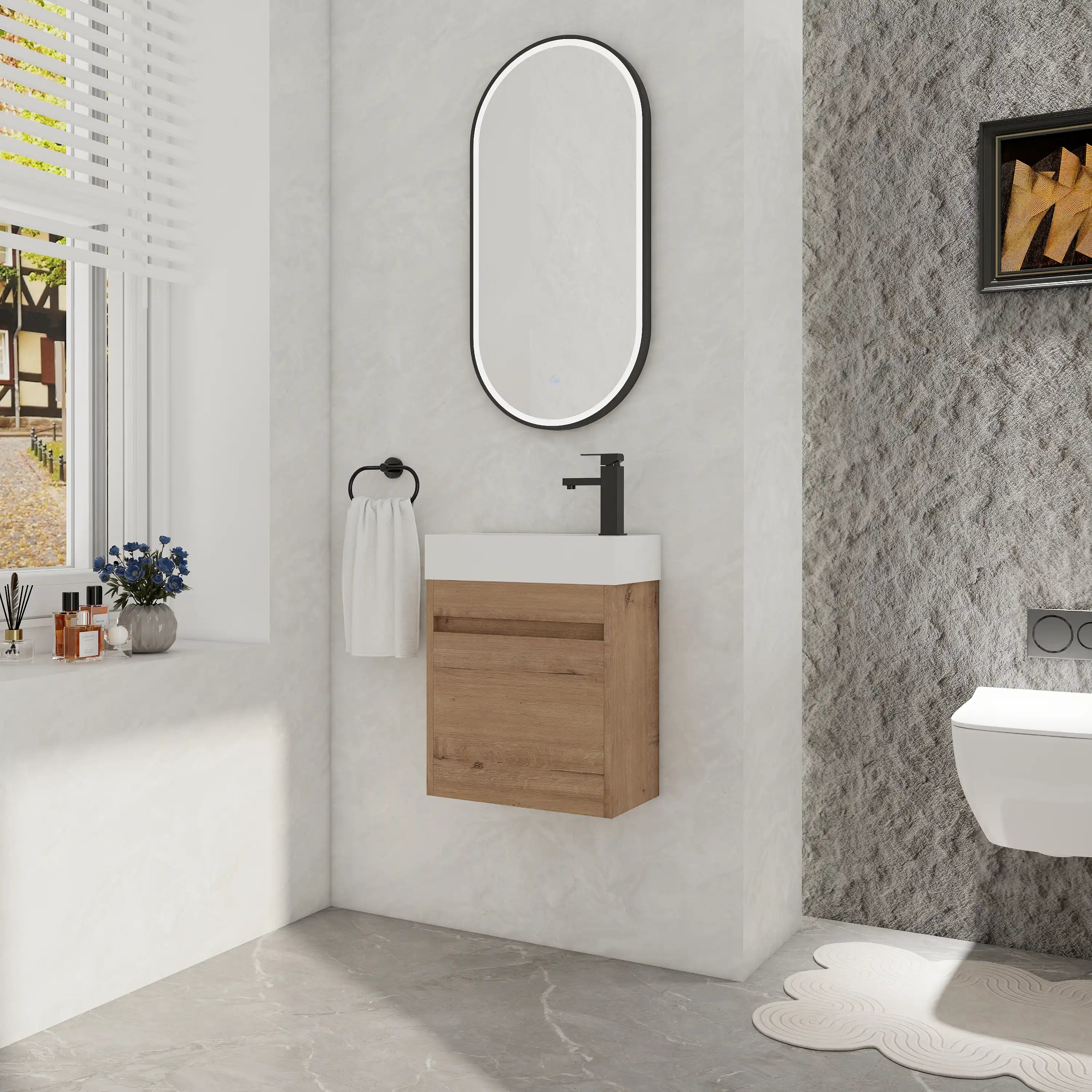 Styled bathroom scene featuring 18" wall mount bathroom sink vanity in imitative oak finish.