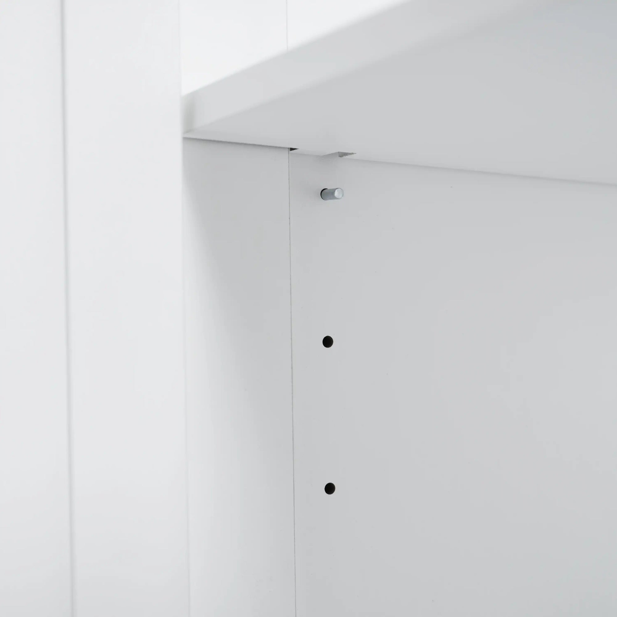Adjustable storage shelf detail inside a freestanding bathroom vanity, offering flexible organization for modern family bathrooms | Ace Decor