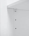 Adjustable storage shelf detail inside a freestanding bathroom vanity, offering flexible organization for modern family bathrooms | Ace Decor