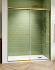 Front view of the 60 x 72 framed shower door with brushed-gold frame and single handle installed in a green-tile bathroom | Ace Decor