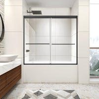Montra Series matte black framed bypass bathtub shower door installed on an alcove tub in a modern bathroom.