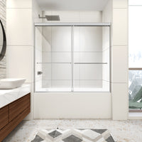 Montra chrome framed double sliding bathtub shower door installed on an alcove tub in a modern bathroom.