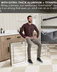 Man sitting on strong aluminum medicine cabinet frame with TitanFrame™ design, supporting 176 lbs.