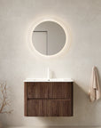 Ravello Series 30" Wall-Mounted Vanity in modern bathroom setting with backlit round mirror.