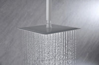 Lorton 12" rain shower head delivering soft rainfall water flow for a relaxing shower experience.