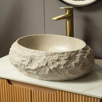 Close-up of sculpted rim and stone texture of Astra Series 18" Oval Sculpted Resin Stone Vessel Basin in ivory | ACE DECOR