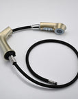 Brushed gold bathroom faucet pull-out sprayer with flexible hose, designed for easy cleaning and modern style | Ace Decor