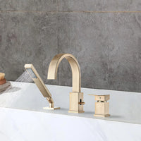 FLUNIX Brushed Gold Waterfall Roman Tub Faucet Set installed on bathtub, handheld shower spraying water.