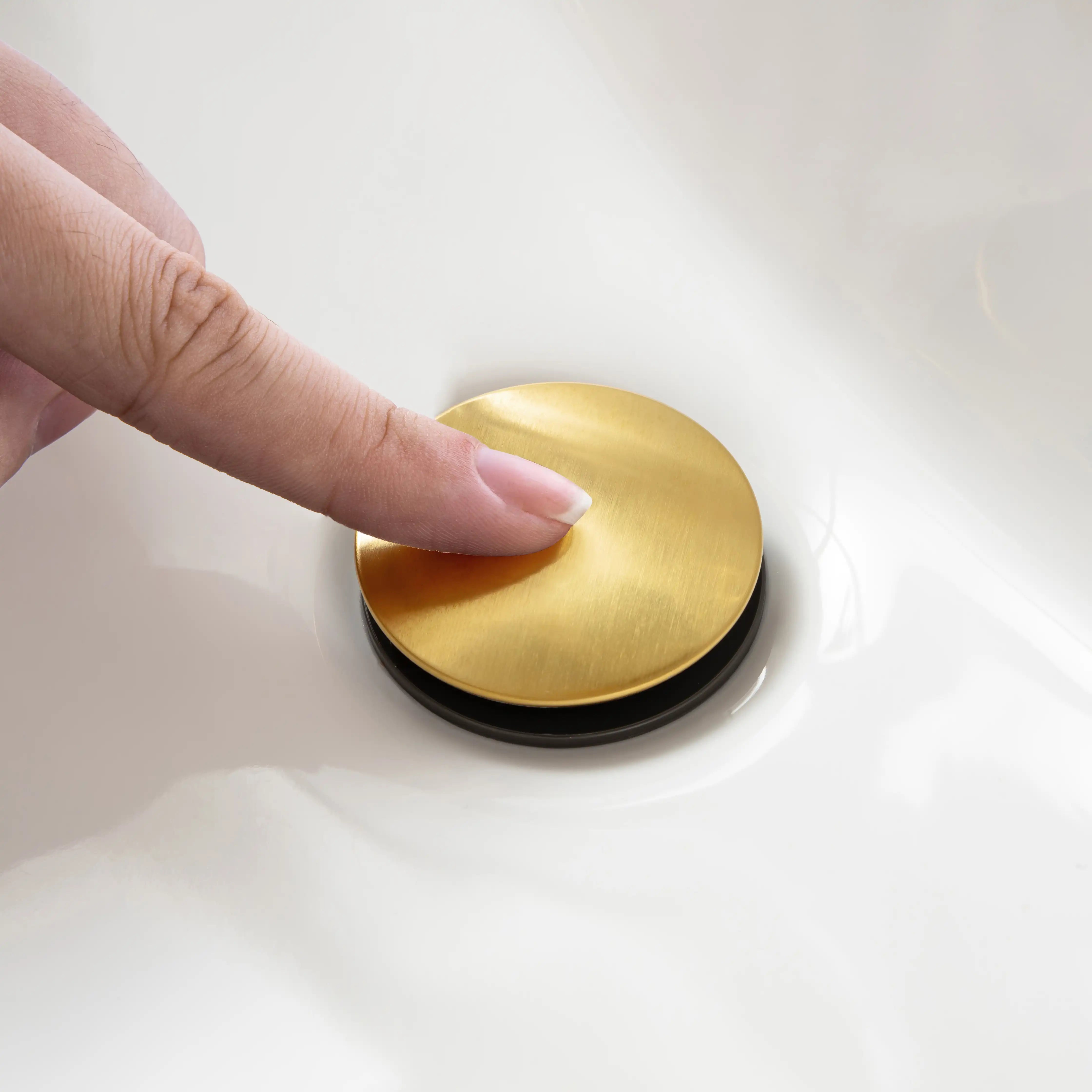 Aurora Series brushed gold sink drain cover matching widespread bathroom faucet
