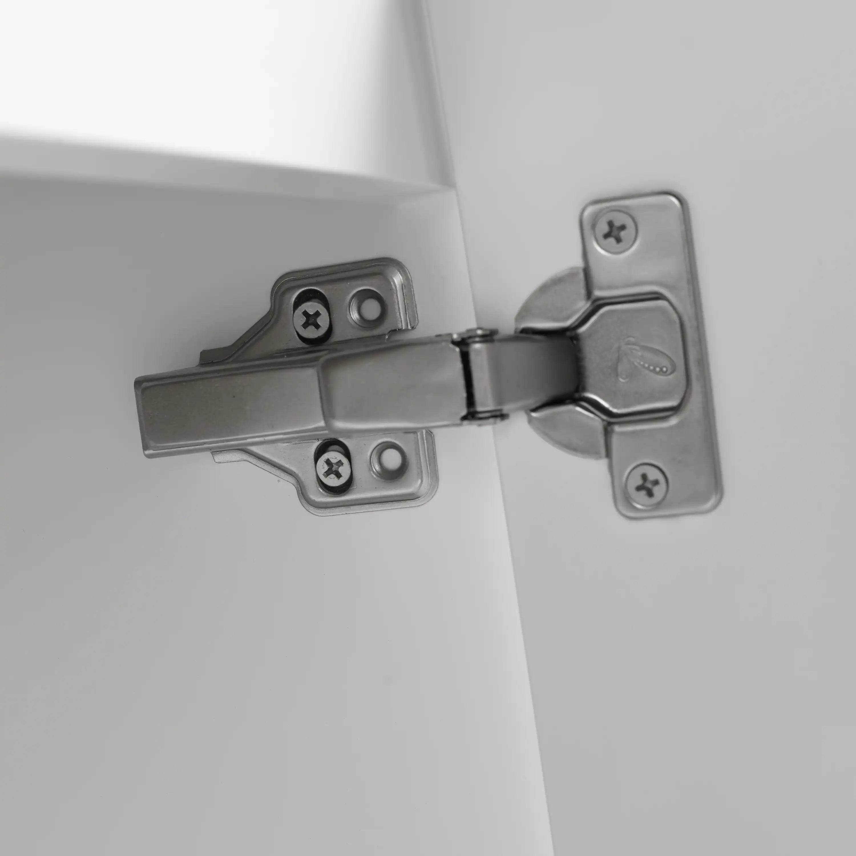 Soft-close hinge detail on floating bathroom vanity 24 inch cabinet door.