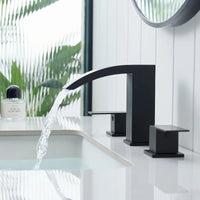 Matte black waterfall bathroom faucet with smooth water flow into sink