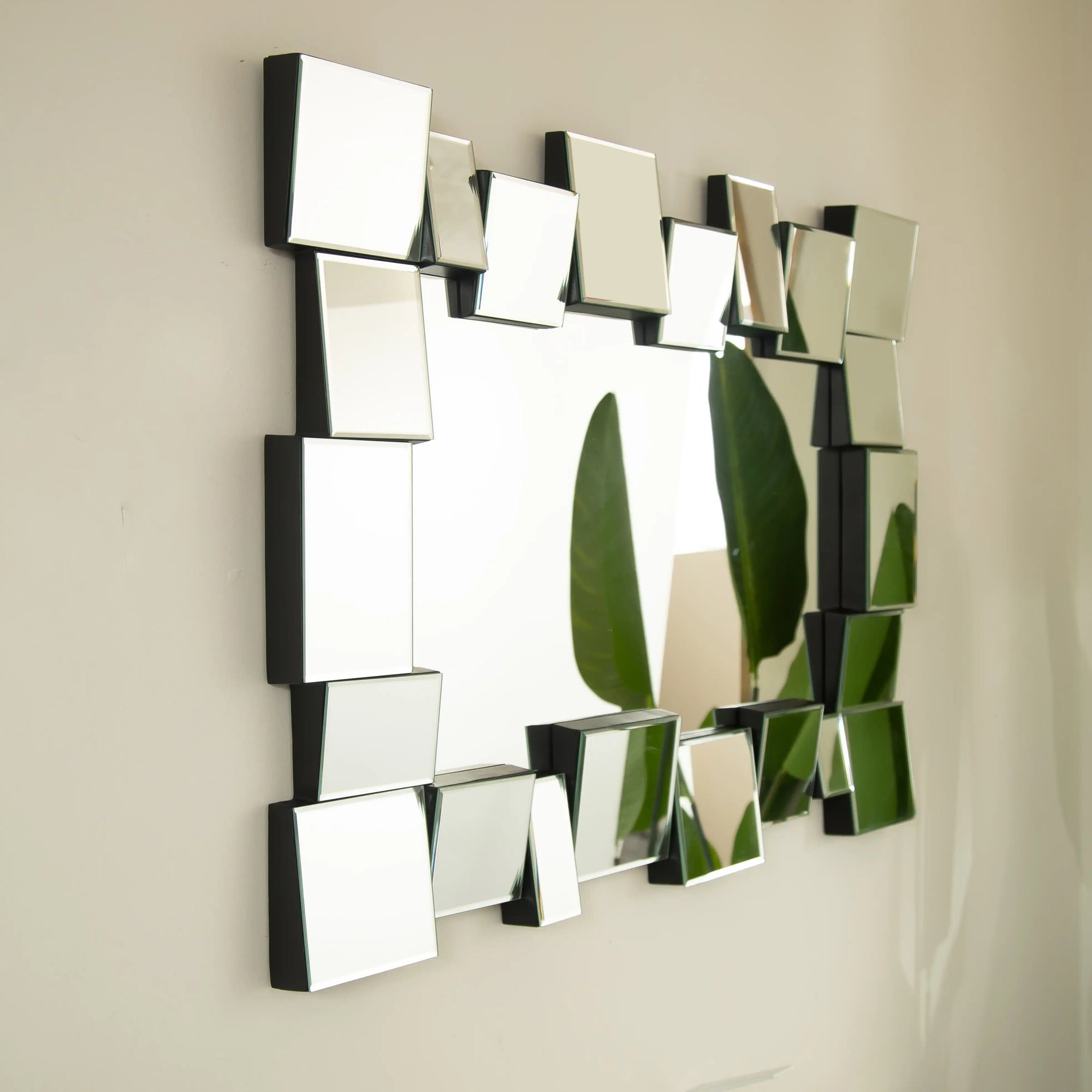 Angled view of the 39 x 29 modern decorative mirror highlighting its multi-layer geometric frame | Ace Decor