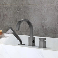 FLUNIX Matte Black Waterfall Roman Tub Faucet Set installed on bathtub, handheld shower spraying water.
