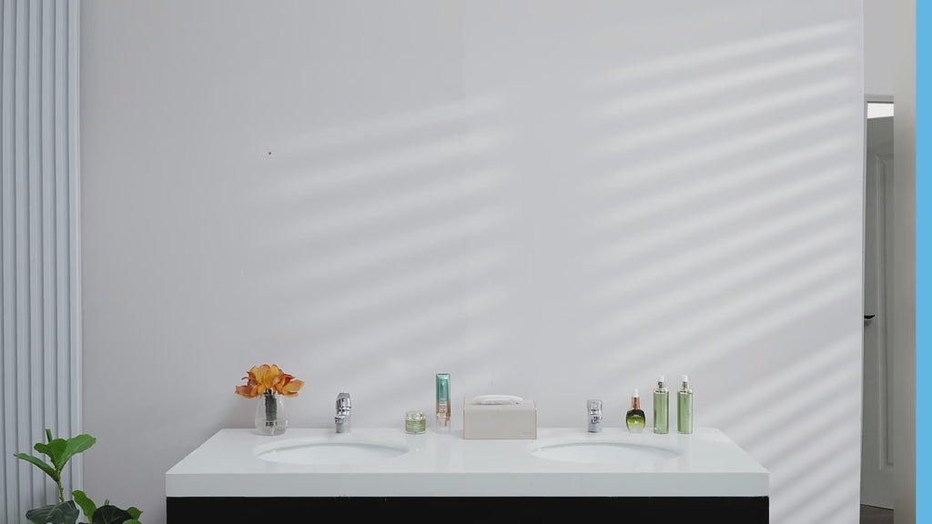 Installation video for framed mirror demonstrating easy mounting using the included self-adhesive positioning ruler for quick, level placement.